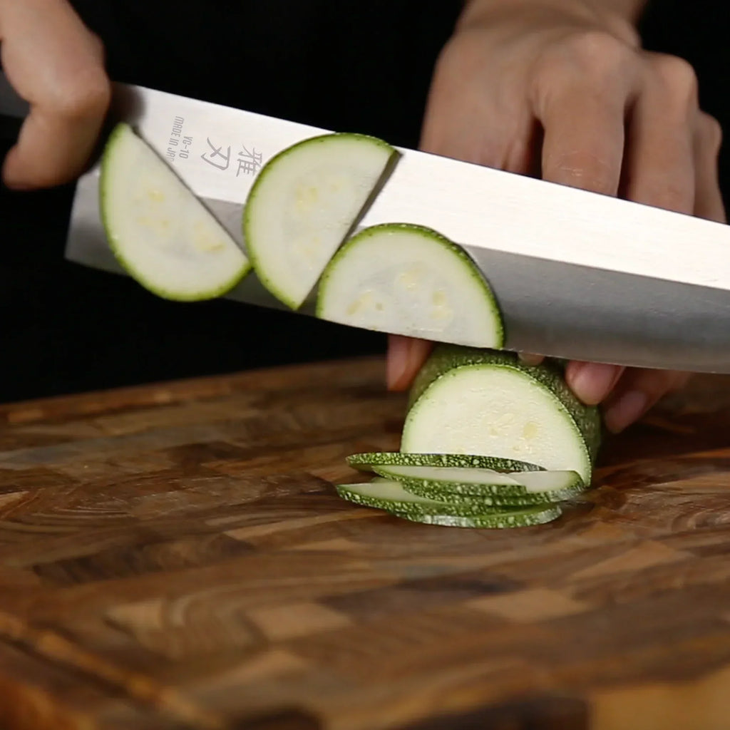Bunka VG-10 knife slicing zucchini thin and clean